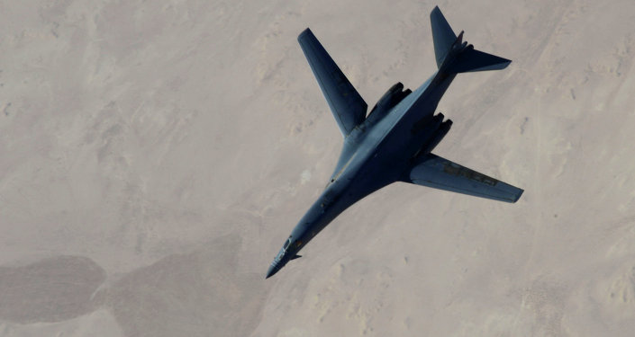 B-1B Lancer disengages from a KC-135 Stratotanker after refueling after airstrikes on Islamic State jihadists in Syria